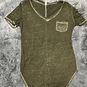 green tee with purposeful worn marks by factory.